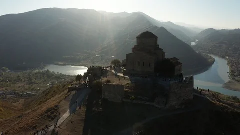 Aerial view of Jvari Monastery in Mtskheta city in summer sunshine. Stock Footage 123983723