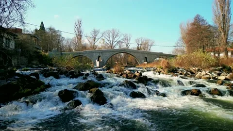Aerial view of Kadin most - a 15th-century stone arch bridge over the Struma  Stock-Footage 230444533