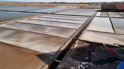 Aerial view of the kampot salt fields in cambodia, showing the intricate network Stock Footage 322519747