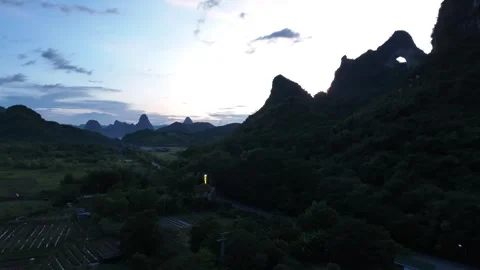 Aerial View Of Karst Mountain Peak At Dusk In Yangshuo Guilin Vídeos de archivo 313060732