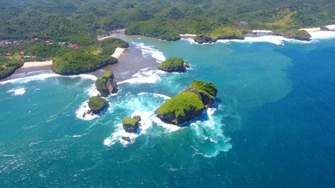 Aerial View of Kasap Beach with small green island Stock Footage 128706312