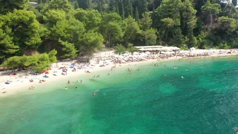 Aerial View of Kasjuni Beach, Split, Croatia - Packed with Beachgoers Stock Footage 301874501