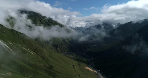 Aerial View On Kazbegi Mountains And Clouds, Caucasus Mountains In Georgia Stock Footage