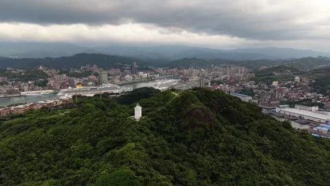 Aerial view of keelung lighthouse overlooking the city and harbor Видео 335862553