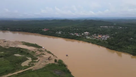 Aerial view of Kelantan river and village Stock Footage 148309401