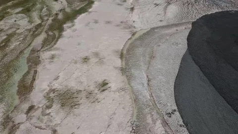 Aerial view of The Kesongo mud volcano area: barren landscape Video stock 279754697