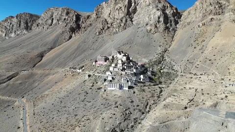 Aerial View of Key Gompa Surrounded by Rugged Mountains Stock Footage 329332097