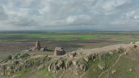 Aerial view of Khor Virap monastery under a cloudy sky, Armenia Vidéo 338010854