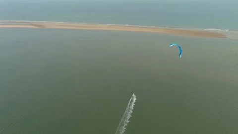 Aerial view of a kitesurfer. Видео 275343607