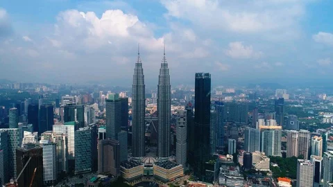 Aerial view KLCC in the middle of Kuala Lumpur cityscape. Stock Footage 99892873