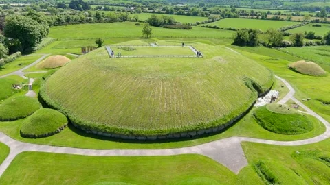 Aerial view of Knowth, the largest, most remarkable ancient monument in Ireland Видео 244098303