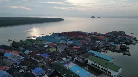 Aerial View of Koh Panyee Floating Village in Phang Nga, Thailand at Sunrise Stock Footage 335254896