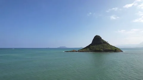 Aerial view of the Koolau Mountain Range and Chinaman's Hat Stock Footage 232648894