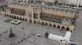 Aerial View of Krakow, Market Square, Town Hall Tower, Cloth Hall, Drapers' Hall HD Footage