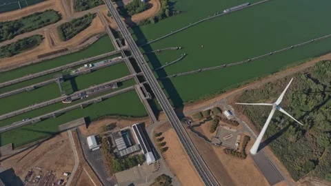 Aerial view of krammersluizen locks and wind turbine in netherlands Stock Footage 342812905