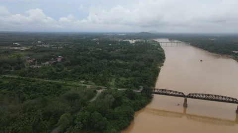 Aerial view of Kusial River, Forest and Guillemard Bridge in Malaysia Stock Footage 148308929