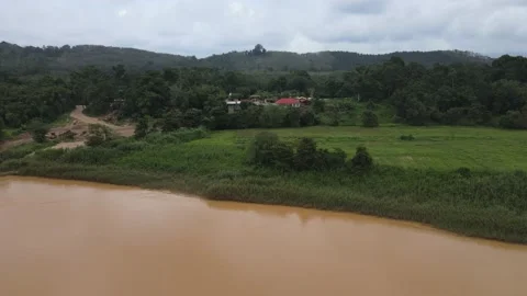 Aerial view of Kusial River, Forest and Village in Kelantan Stock Footage 148309063