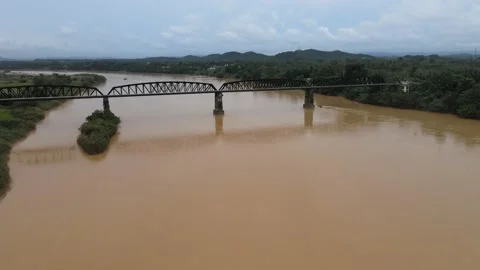 Aerial view of Kusial River, Forest and Guillemard Bridge in Kelantan Stock Footage 148309375