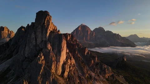Aerial View of La Gusela Peak Above Giau Pass in Dolomites, Italy on Golden Stock Footage 346507833
