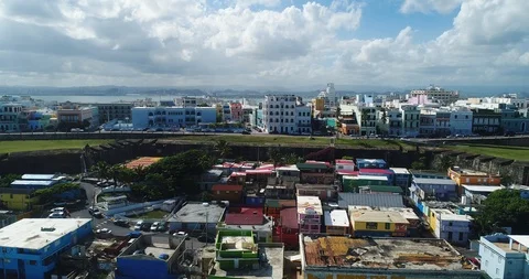 An aerial view of La Perla in Old San Juan, Puerto Rico, on a sunny morning 스톡 동영상 119744009