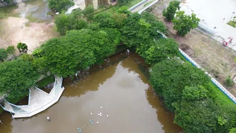Aerial view of a lake in a city square as a place to relax and unwind with .. Stock-Footage 296482353