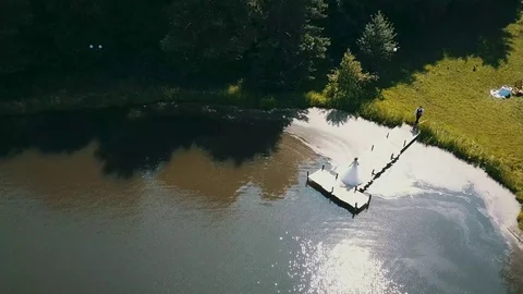 Aerial view, lake in the forest, the first meeting of the bride and groom 스톡 동영상 114418694