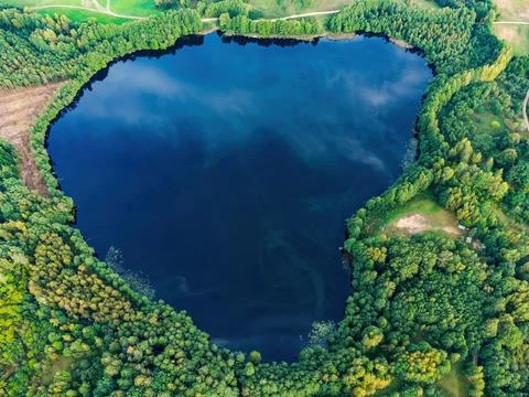 Aerial view of a lake in the forests of Lithuania, wild nature Stock Photos