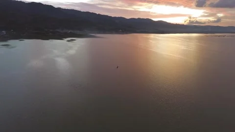 Aerial View of Lake with sunset background Stock Footage 290846730