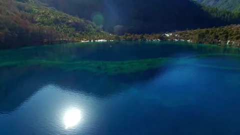 Aerial View of Lake Surface Waves in Jiuzhaigou Sichuan China Video stock 336899035