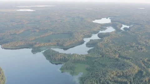Aerial view of lakes and forests from high altitude Stock Footage 333837705