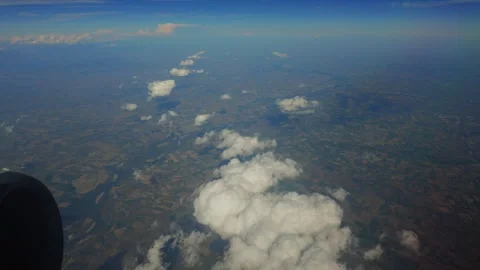 Aerial View of Landscape and Clouds from Airplane Window Stock Footage 345003576