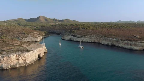 Aerial view of the landscape with cliffs and boats Stock Footage 129698627