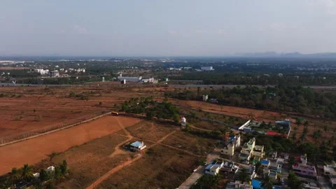 Aerial view of a landscape featuring rural development and dry agricultural.. Stock Footage 337526219