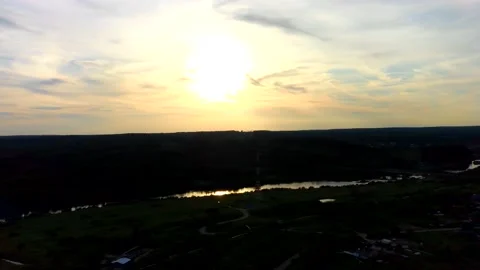 Aerial view of the landscape at sunset. River and city Video stock 136869582