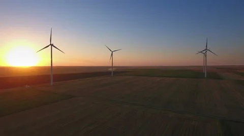 Aerial view of landscape with types of fields and wind turbines at sunset 스톡 동영상 65629731