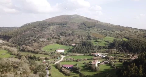 Aerial view of landscape with windmill in the background, Portugal Stock Footage 115836214