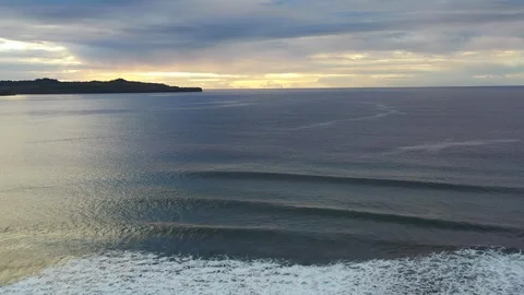 Aerial View of Languid Waves in Remote Island Setting, Papua New Guinea Stock Footage 105805909
