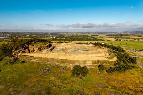 Aerial View of a Large Active Open Pit Quarry Showing Excavation Work Amids.. Stock Photos