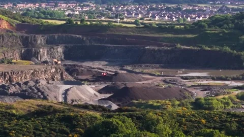 Aerial View, Large Active Quarry with background Residential Area 库存影片 337782664