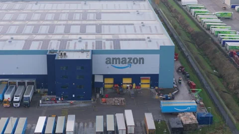 Aerial view of large Amazon distribution centre in the United Kingdom Stock Footage 293745680