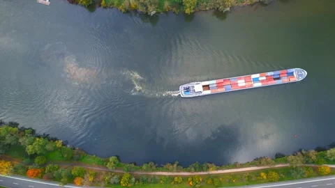 Aerial view of large barge with containers cruising through moselle river i.. Video stock 313163784
