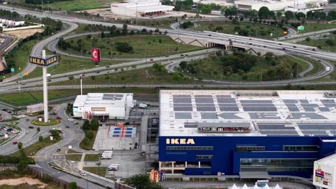 Aerial View of Large Blue Retail Store Building with Parking and Highways Vídeos de archivo 336948643