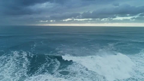 Aerial view of a large breaking wave in Nazare, Portugal. Stock Footage 346658654