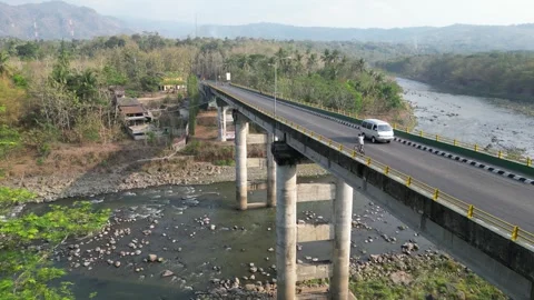 Aerial view of a large bridge built with sturdy and strong concrete pillars Video stock 290934271