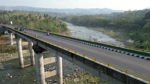 Aerial view of a large bridge built with sturdy and strong concrete pillars Video stock 290937625