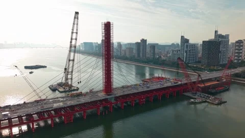 Aerial view of a large bridge over the river is in the process of being Video stock 335643605