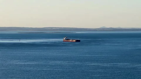 Aerial View of Large Cargo Ship Navigating Port Phillip Bay Vídeos de archivo 325257349