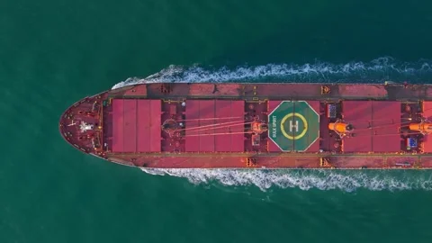Aerial view of a large cargo ship with a helipad on deck, Netherlands. Stock Footage 336363252