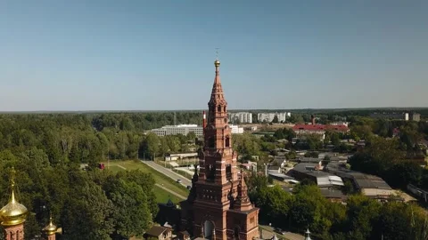 Aerial view of the large Christian monastery with golden domes Stock Footage 302930044