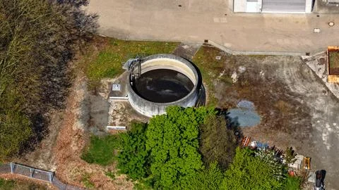 Aerial View of Large Circular Clarifier Tank at Wastewater Treatment Plant Stock Photos